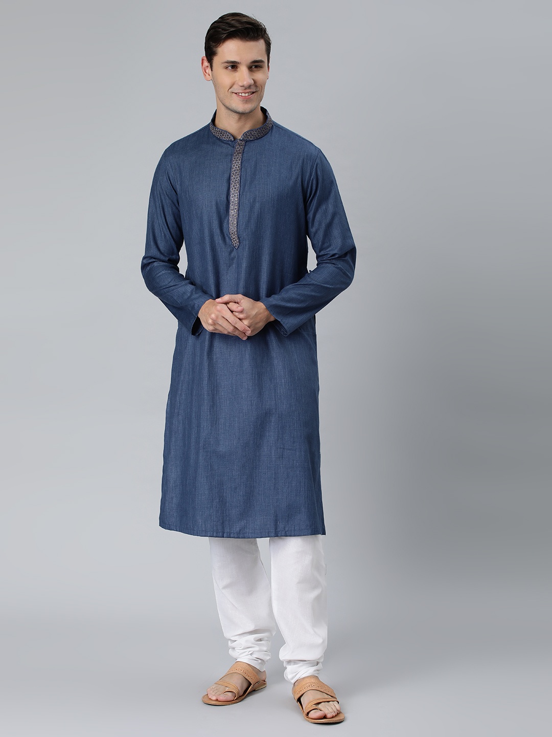 

Manthan Navy Blue Solid Mandarin Collar Kurta