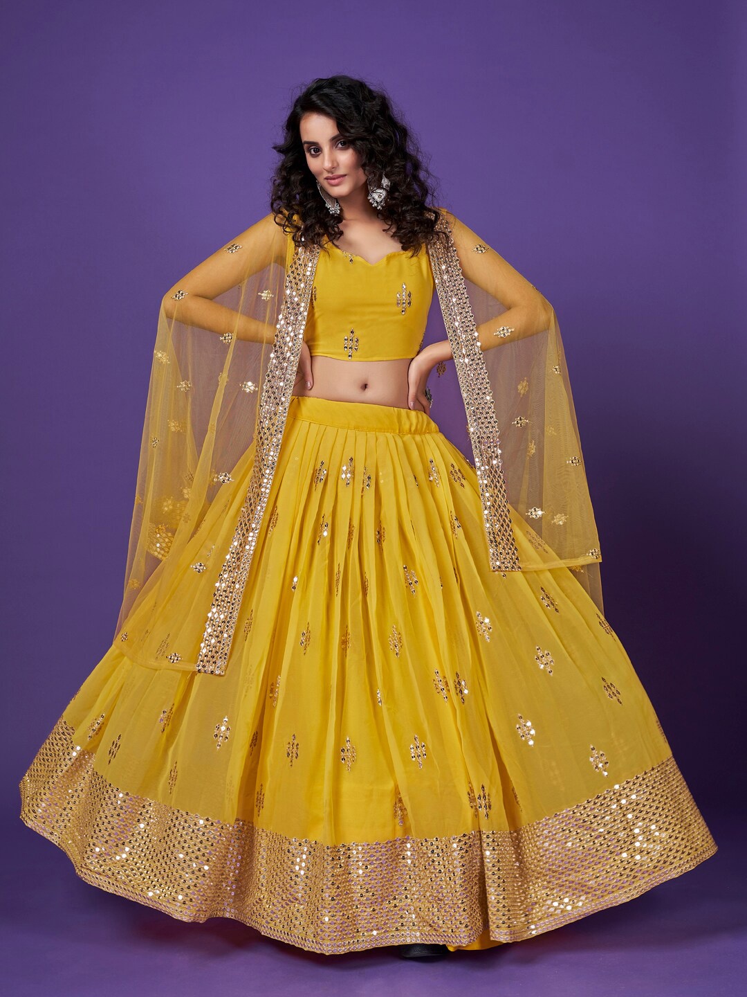 

SHOPGARB Yellow Sequins Embroidered Georgette Haldi Wear Lehenga Choli