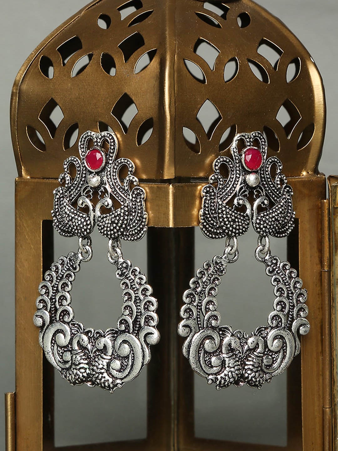 

OOMPH Women Oxidized Silver-Plated Peacock Shaped Drop Earrings