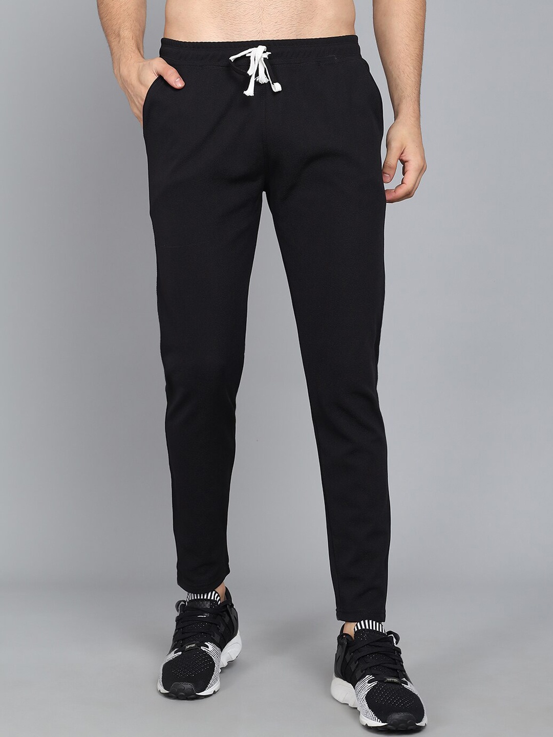 

Kushi Flyer Men Black Solid Track Pants