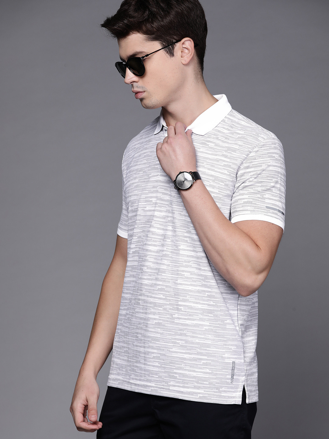 

Louis Philippe Ath Work Men Self- Design Polo Collar Slim Fit T-shirt, White