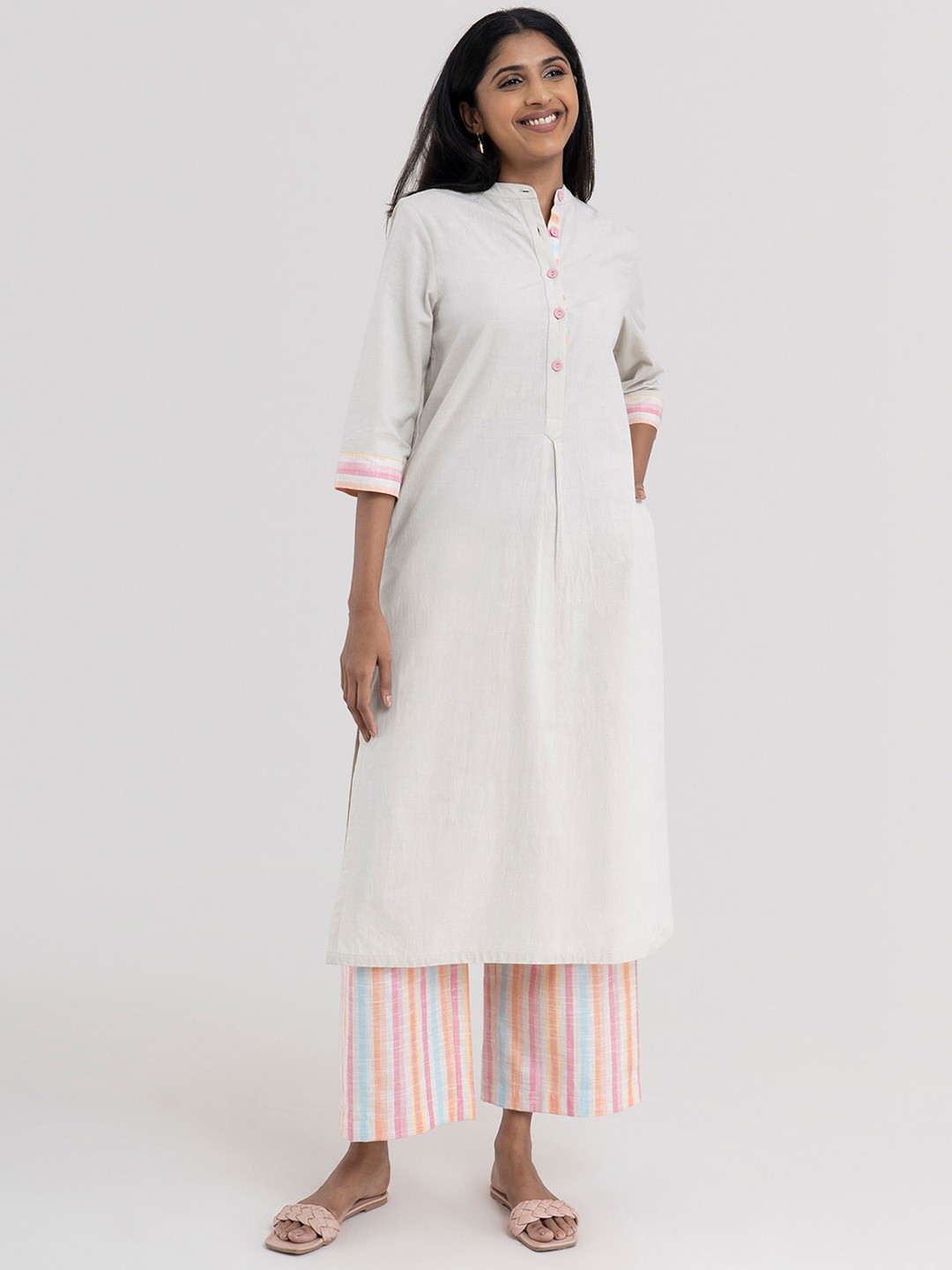 

Pink Fort Women Beige Solid Kurta