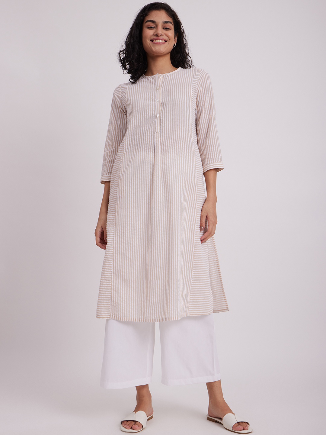 

Pink Fort Women White Striped Flared Sleeves Thread Work Kurta