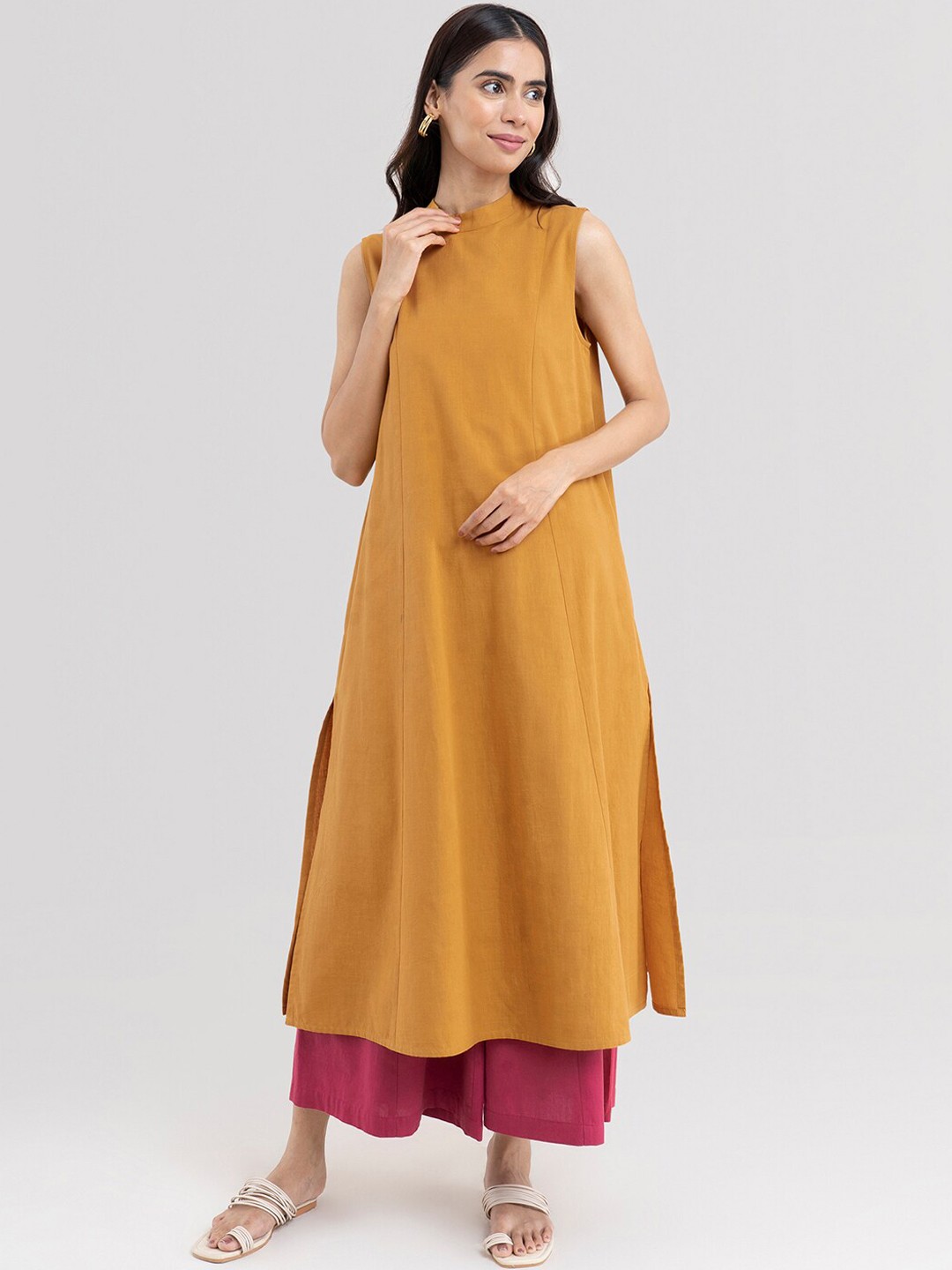 

Pink Fort Women Mustard Solid Sleeveless A-line Kurta