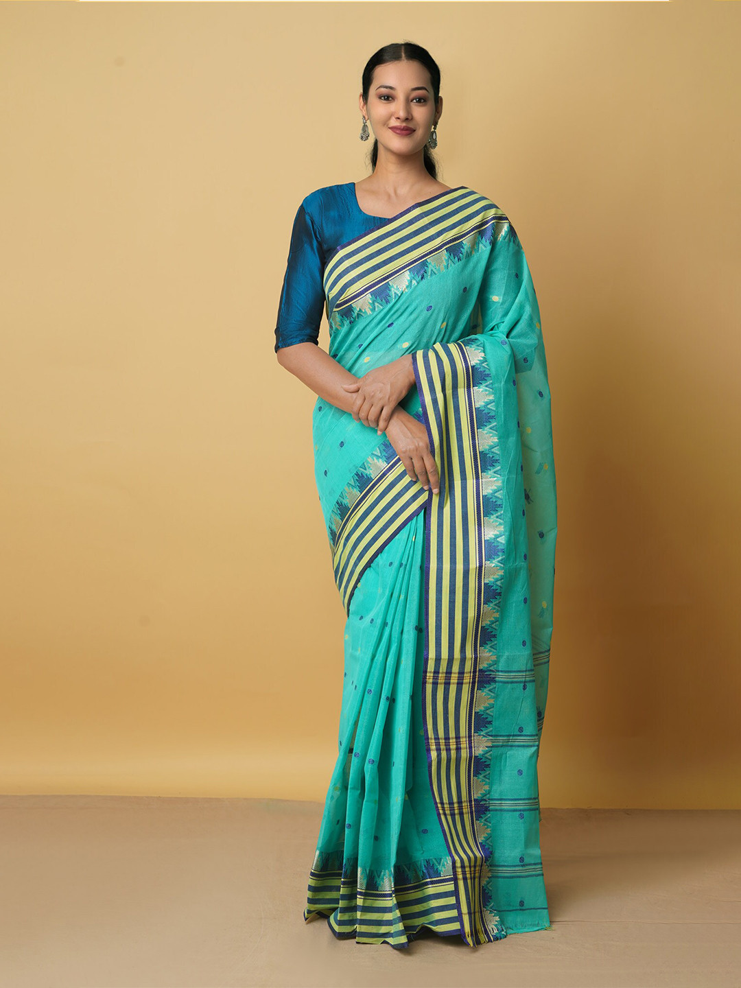 

Unnati Silks Green & Beige Ethnic Motifs Pure Cotton Jamdani Saree