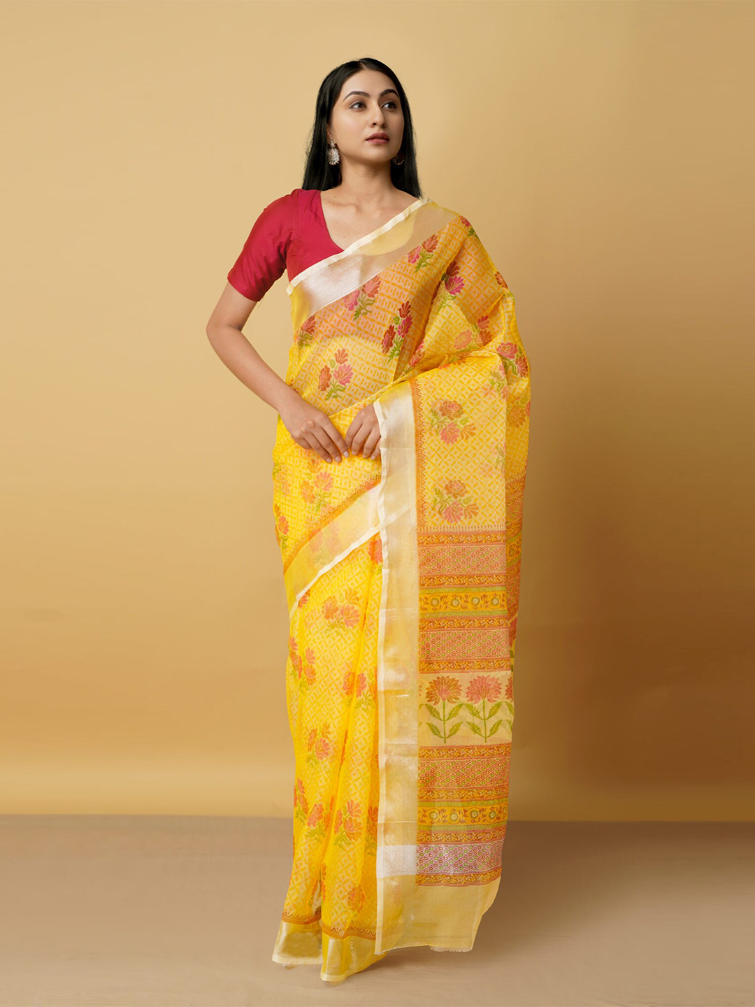 

Unnati Silks Yellow & Red Floral Zari Organza Bhagalpuri Saree