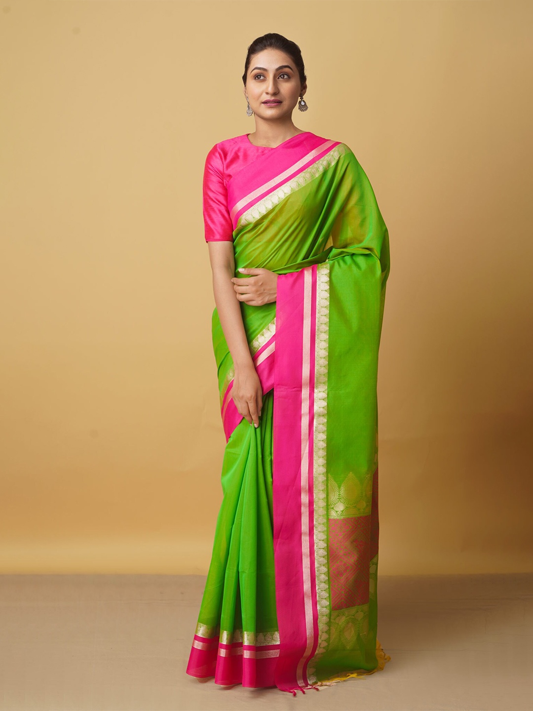 

Unnati Silks Green & Pink Woven Design Zari Art Silk Chanderi Saree