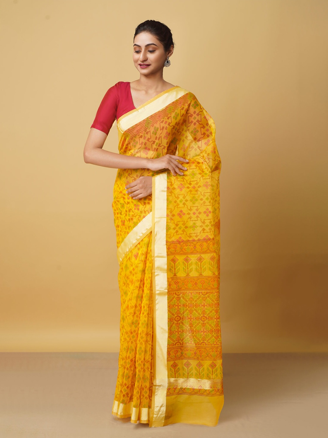 

Unnati Silks Orange & Red Ethnic Motifs Zari Organza Saree