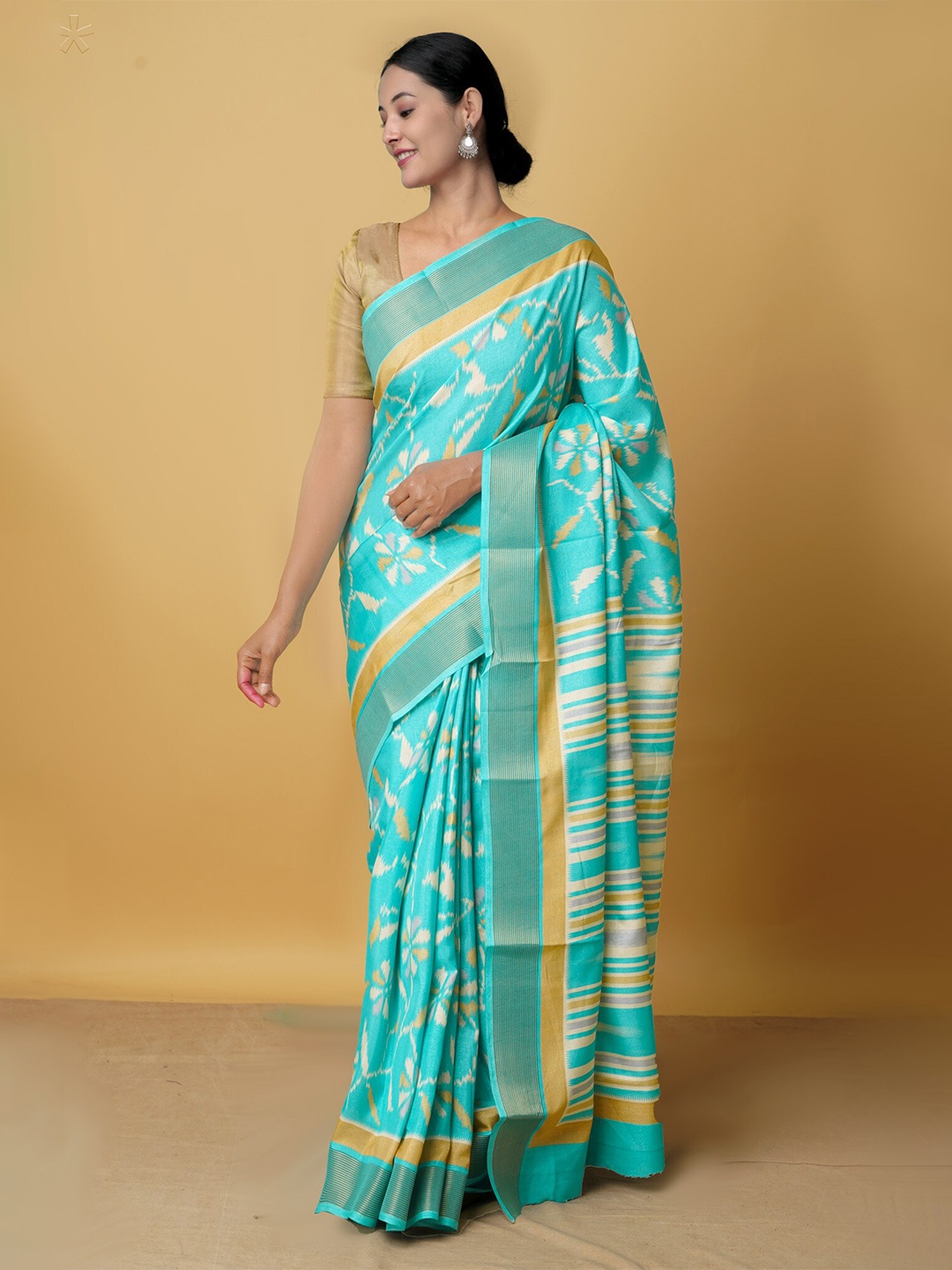 

Unnati Silks Blue & Gold-Toned Floral Zari Art Silk Block Print Saree