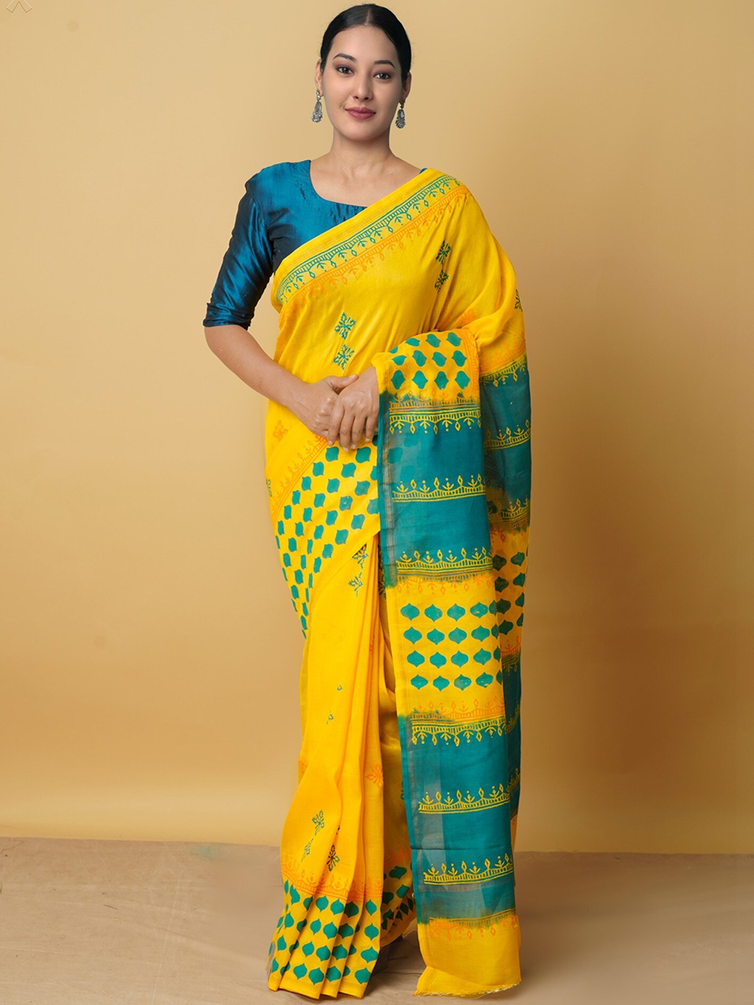 

Unnati Silks Yellow & Green Ethnic Motifs Pure Cotton Chanderi Saree