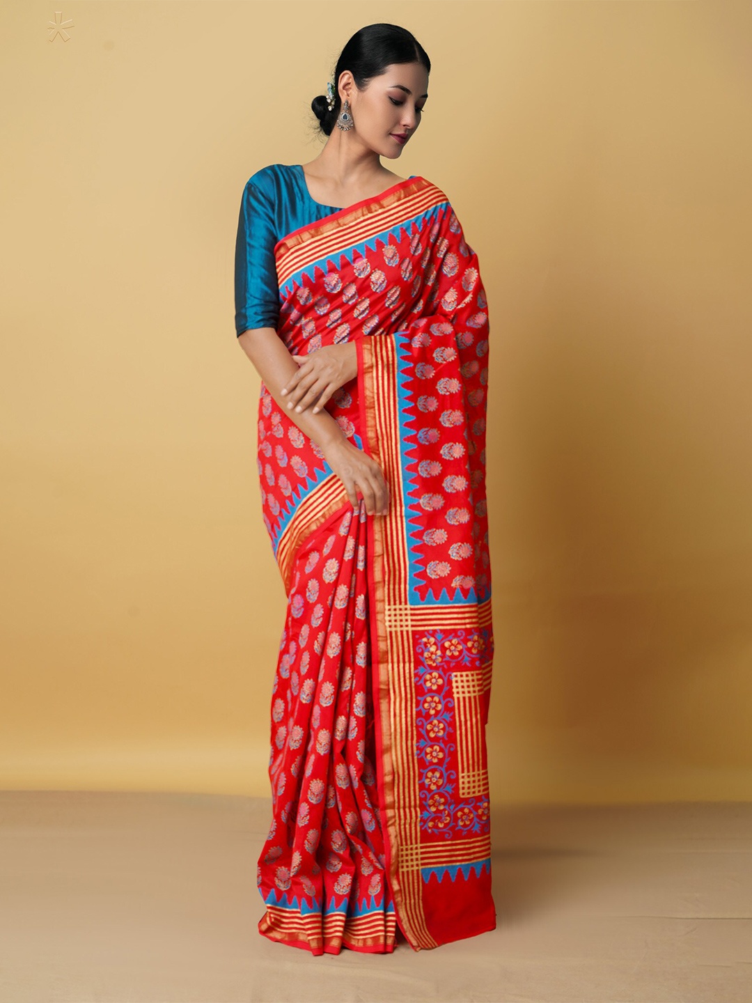

Unnati Silks Red & Blue Floral Zari Silk Cotton Chanderi Saree