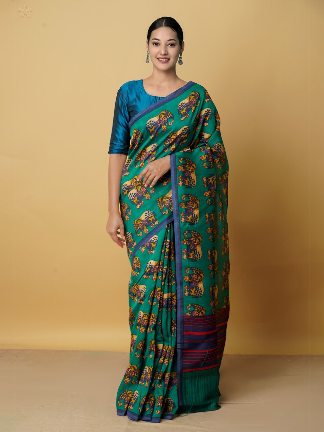 

Unnati Silks Green & Blue Ethnic Motifs Zari Silk Cotton Chanderi Saree