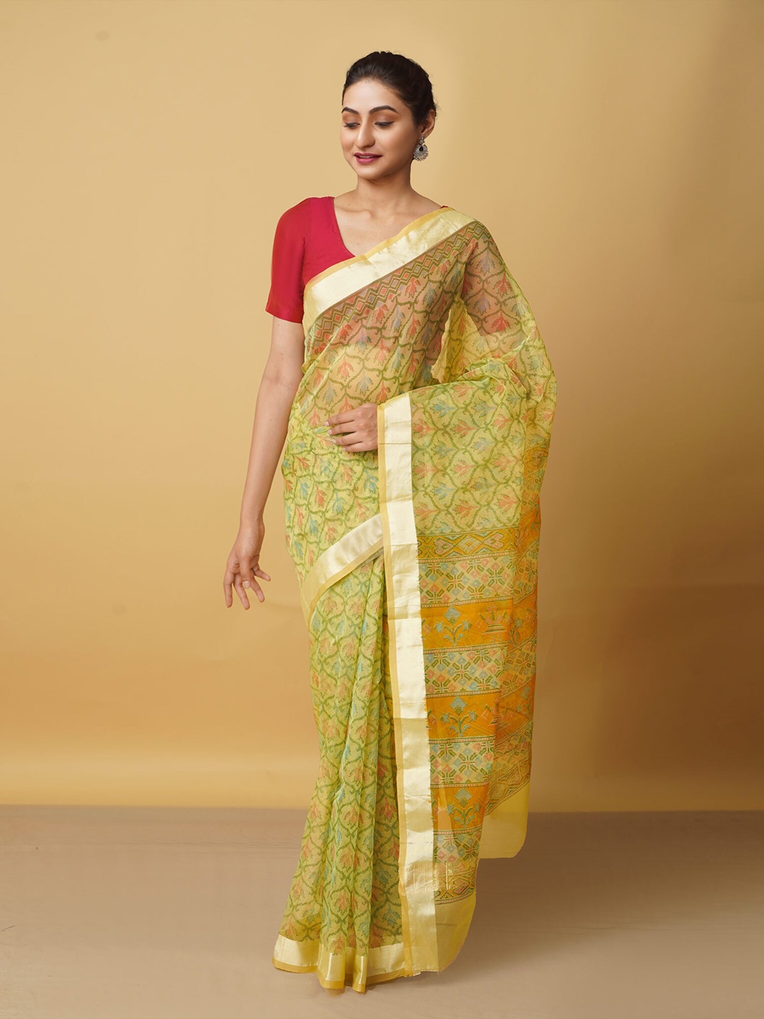 

Unnati Silks Green & Pink Ethnic Motifs Zari Organza Bhagalpuri Saree