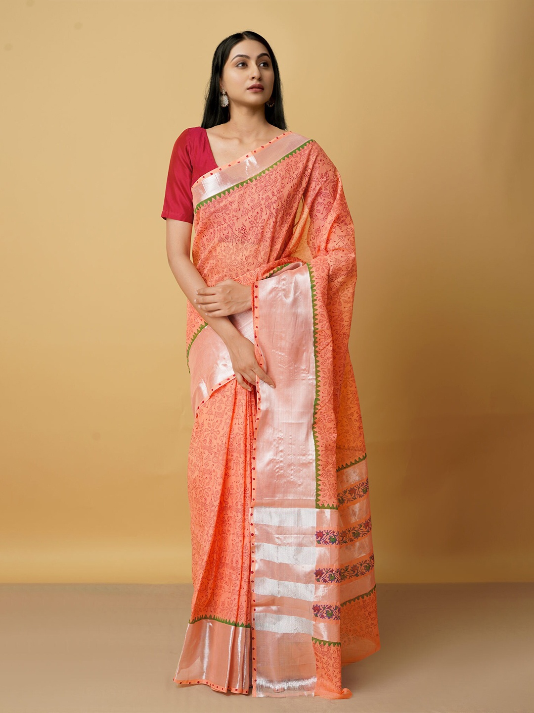 

Unnati Silks Orange & Silver-Toned Ethnic Motifs Zari Pure Cotton Chettinad Saree