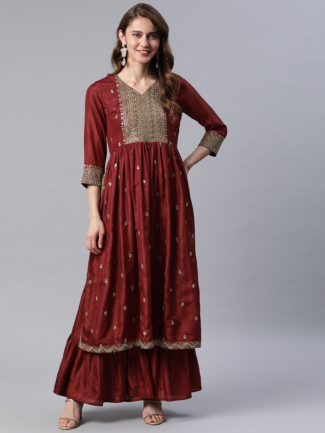 

Cottinfab Women Maroon & Golden Ethnic Motifs Sequinned Kurta with Sharara