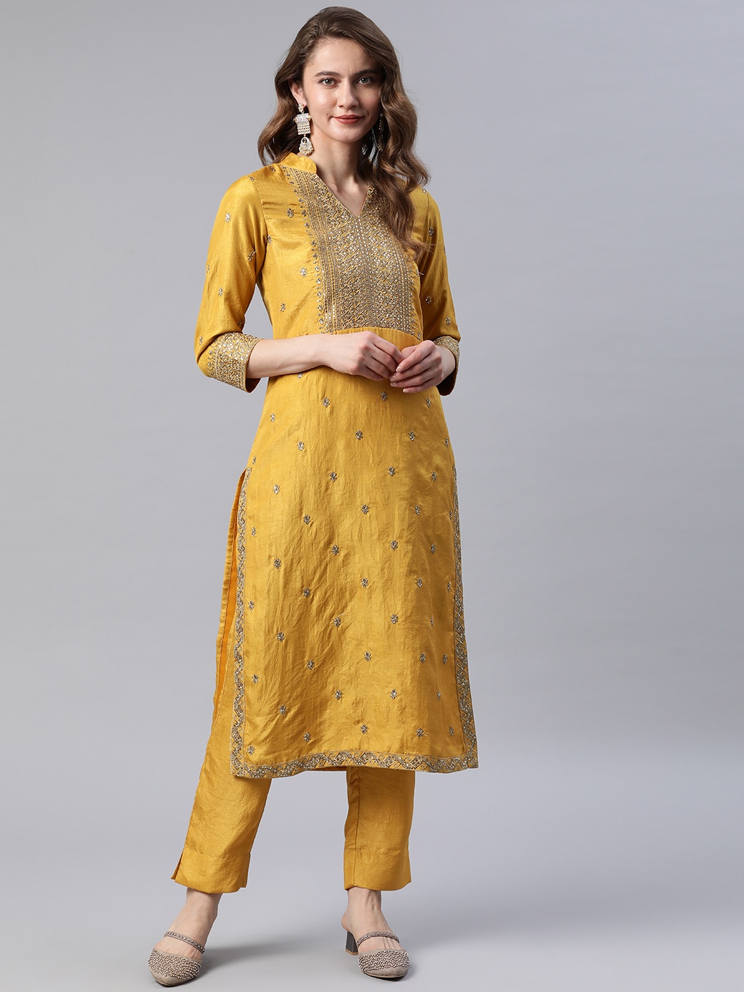 

Cottinfab Women Mustard Yellow Ethnic Motifs Embroidered Sequinned Kurta with Trousers