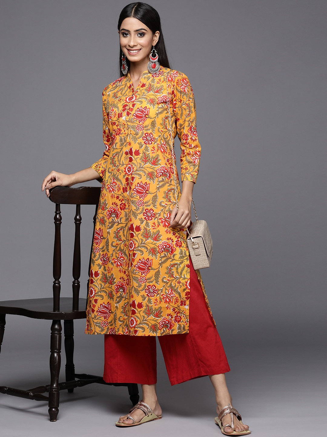 

Varanga Women Yellow & Red Ethnic Motifs Printed Kurta