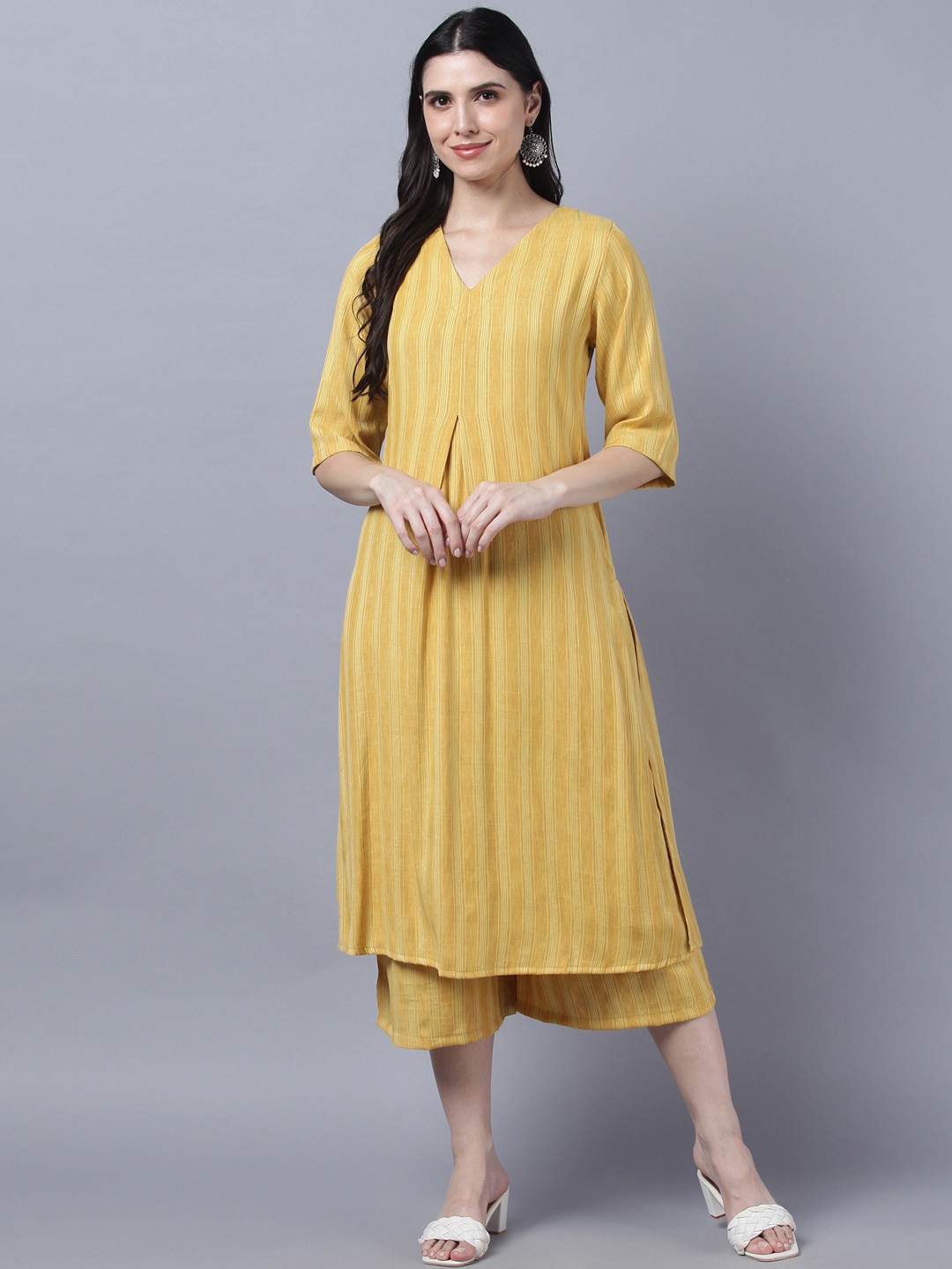 

Myshka Woman Yellow Striped Layered Pure Cotton Kurta with Palazzos