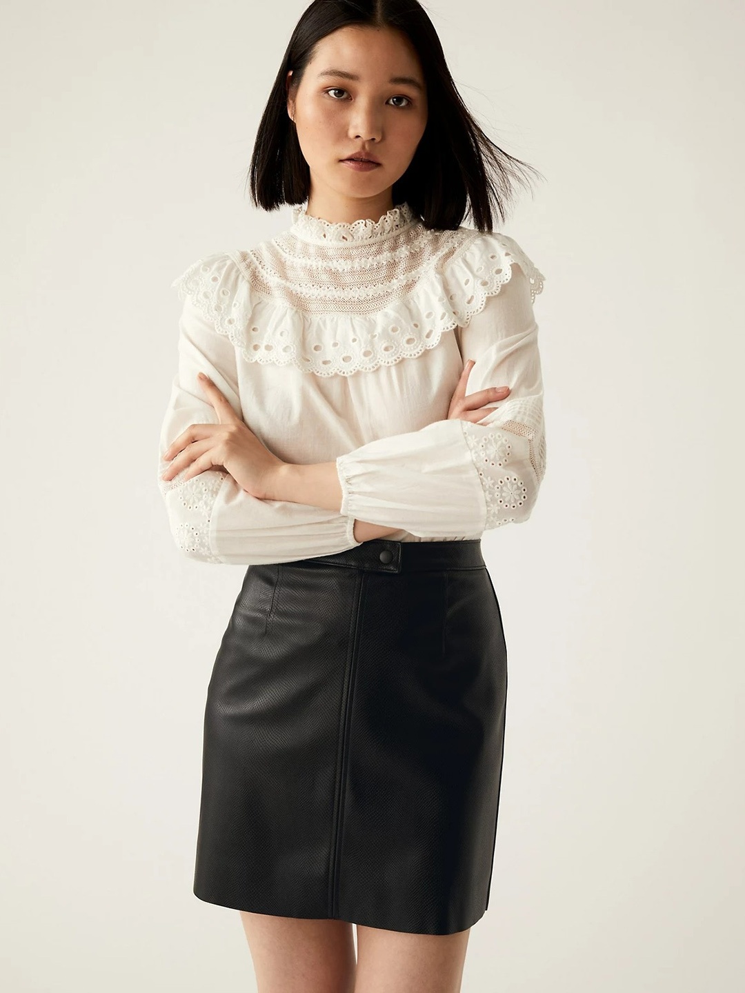 

Marks & Spencer Women Black Solid Mini Pencil Skirt