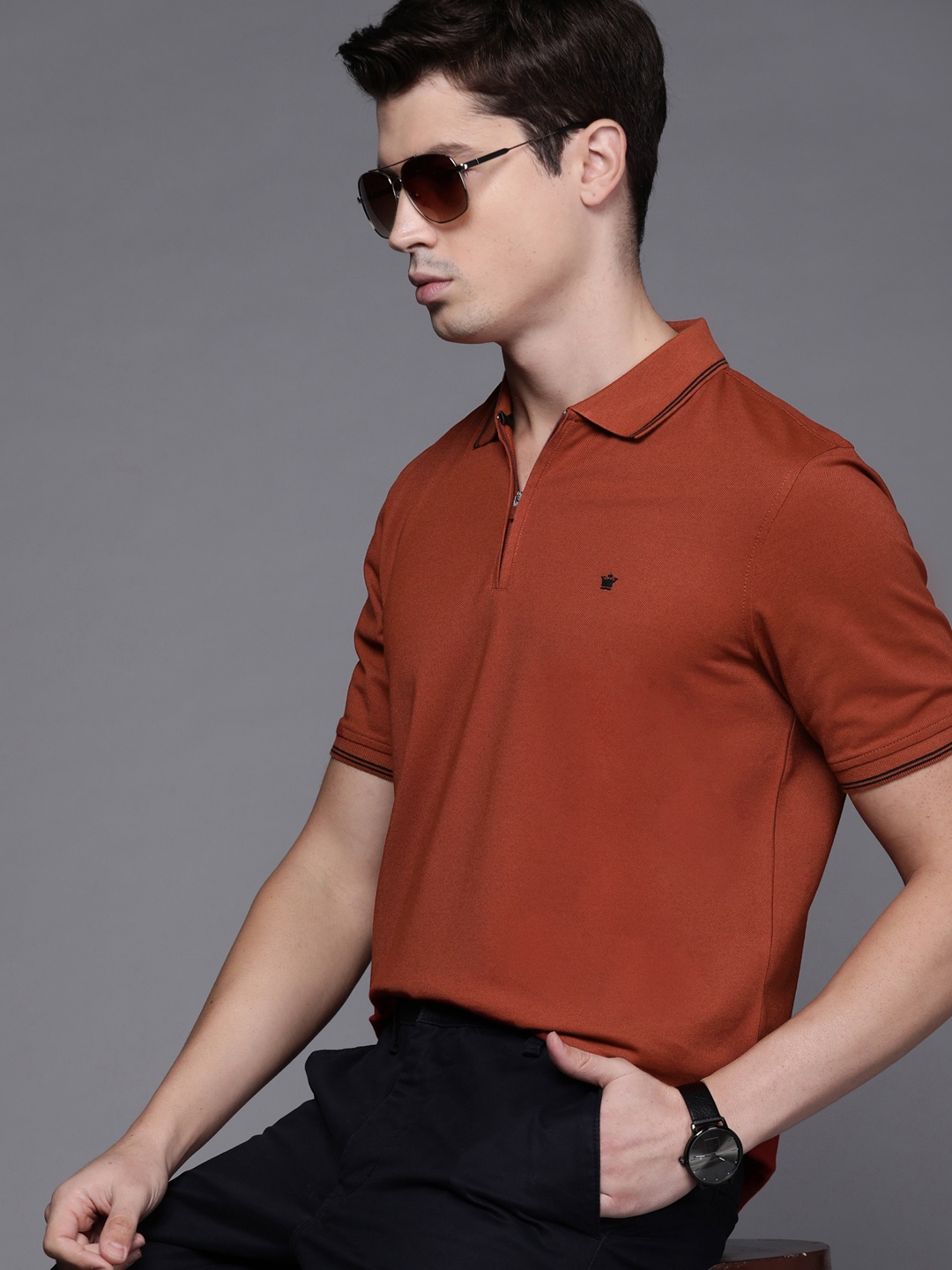 

Louis Philippe Men Solid Polo Collar T-shirt, Rust