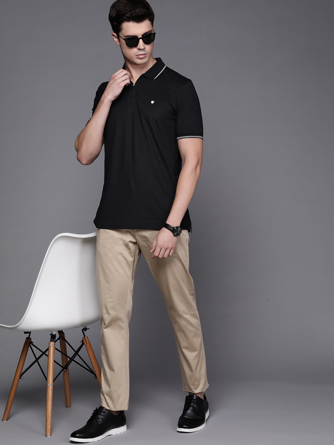 

Louis Philippe Men Solid Polo Collar T-shirt, Black