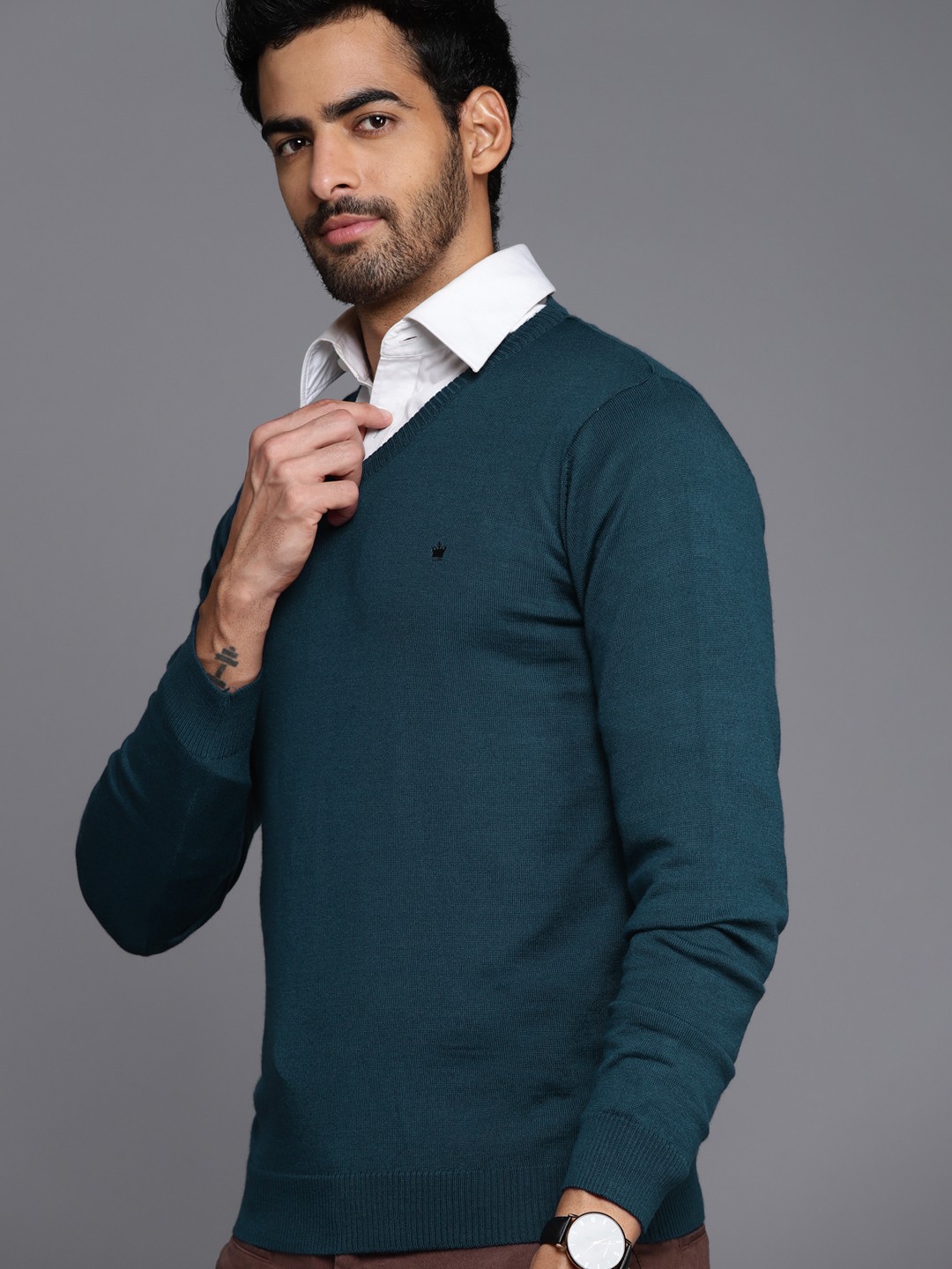 

Louis Philippe Men Teal Green V-Neck Solid Pullover
