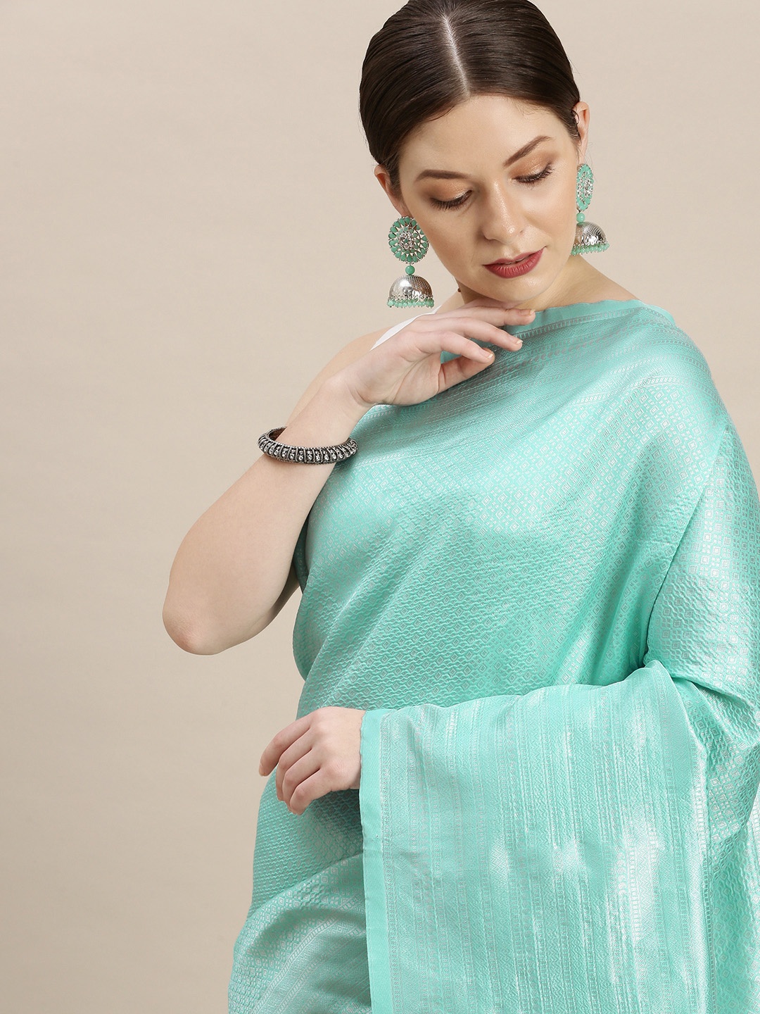 

MARGI DESIGNERS Woven Design Zari Banarasi Saree, Turquoise blue