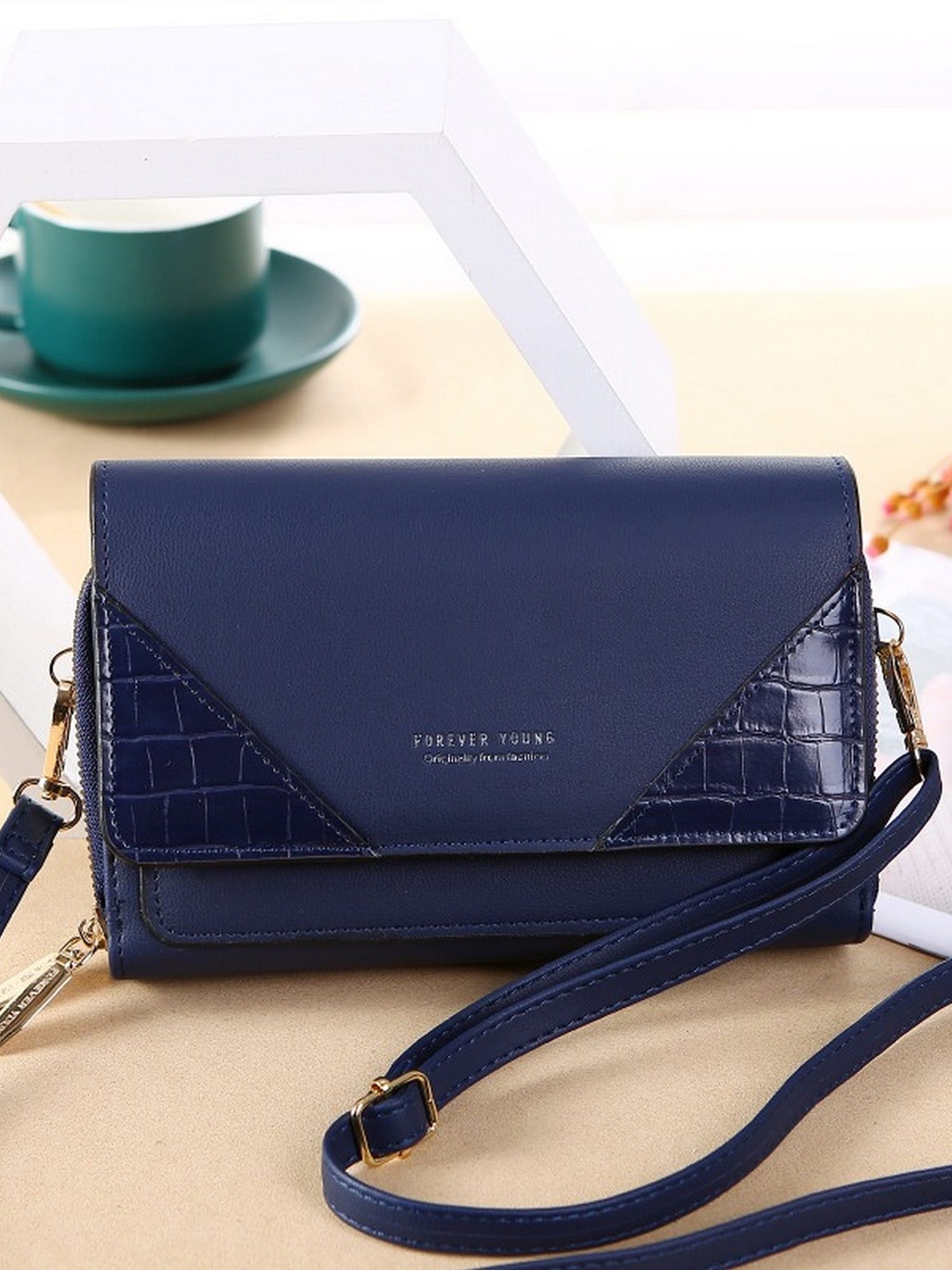 

Diva Dale Blue PU Structured Sling Bag