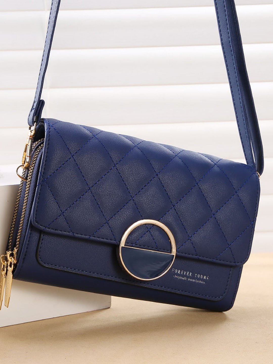 

Diva Dale Blue Textured PU Structured Sling Bag