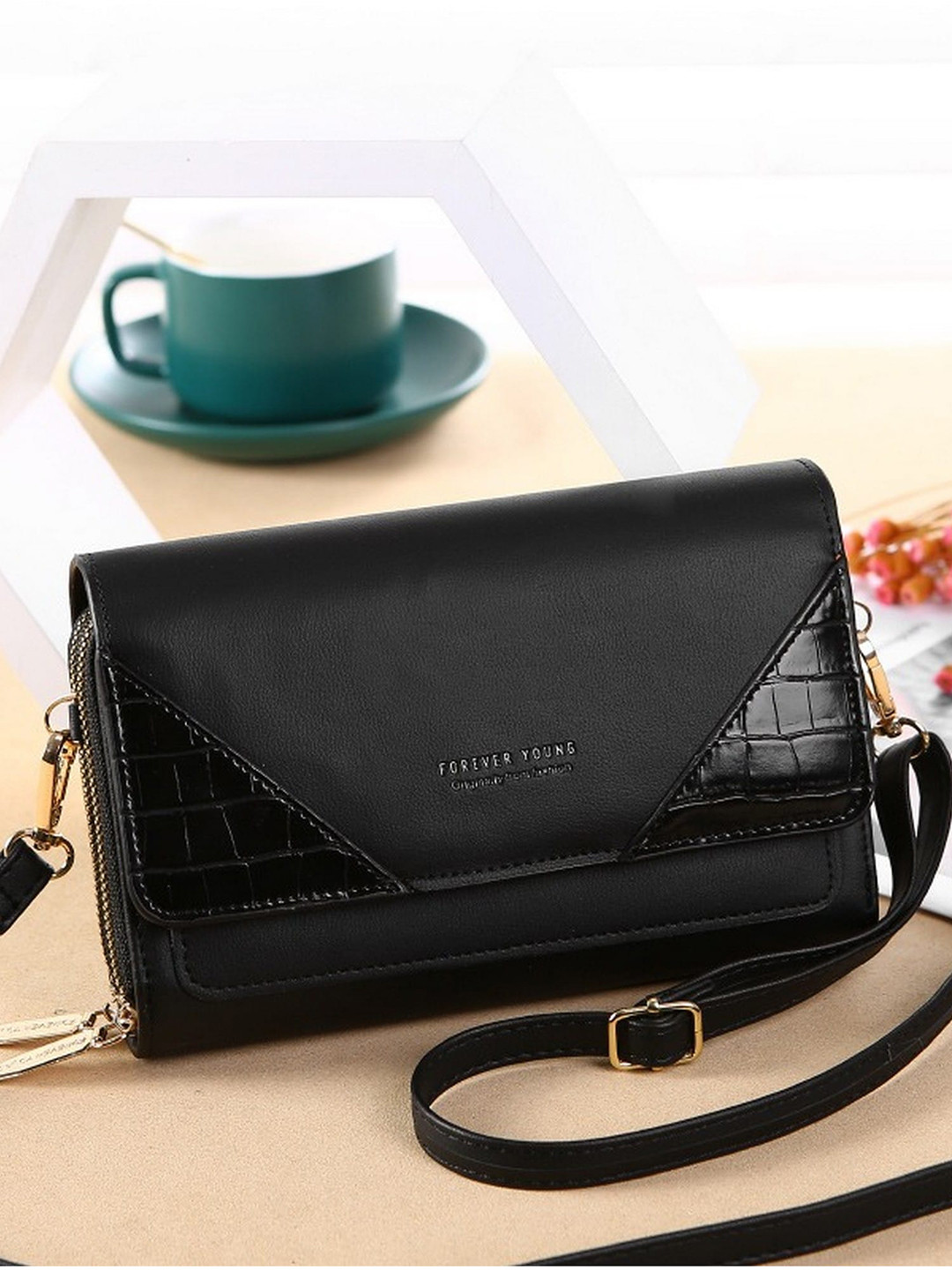 

Diva Dale Black PU Structured Sling Bag