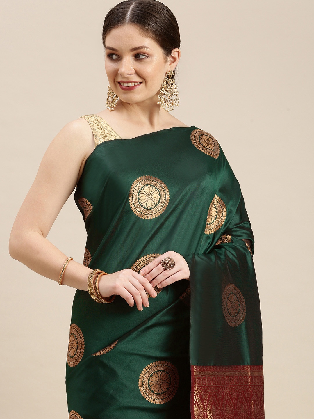 

MARGI DESIGNERS Green & Golden Zari Woven Design Banarasi Saree