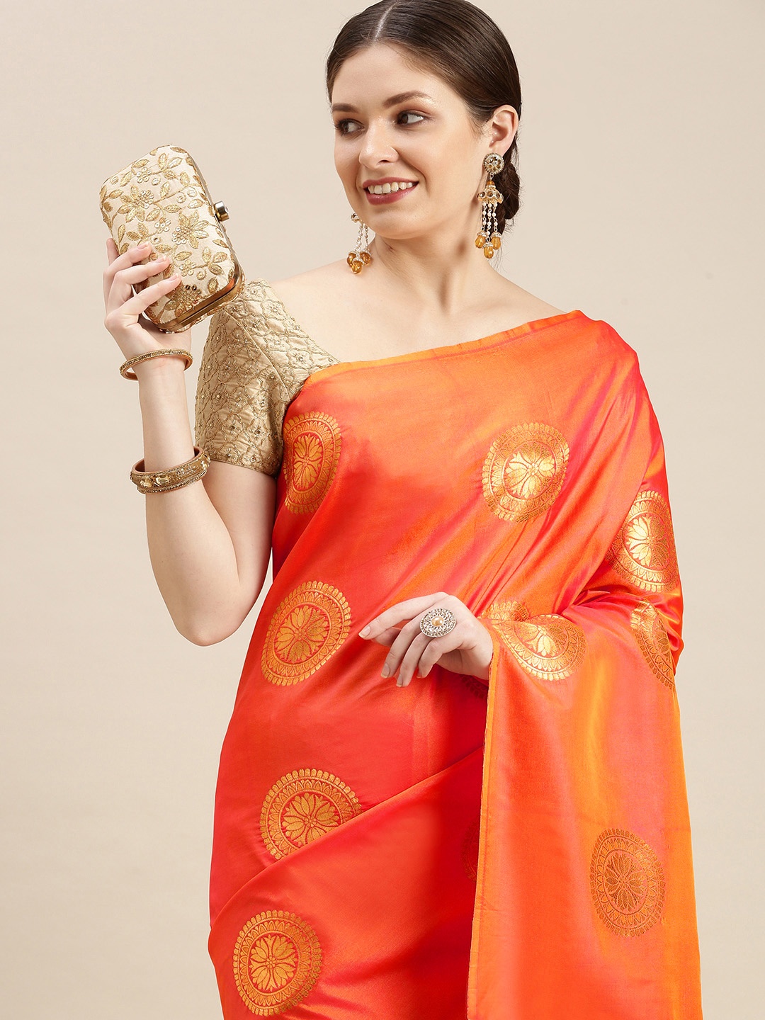 

MARGI DESIGNERS Orange & Golden Zari Woven Design Banarasi Saree