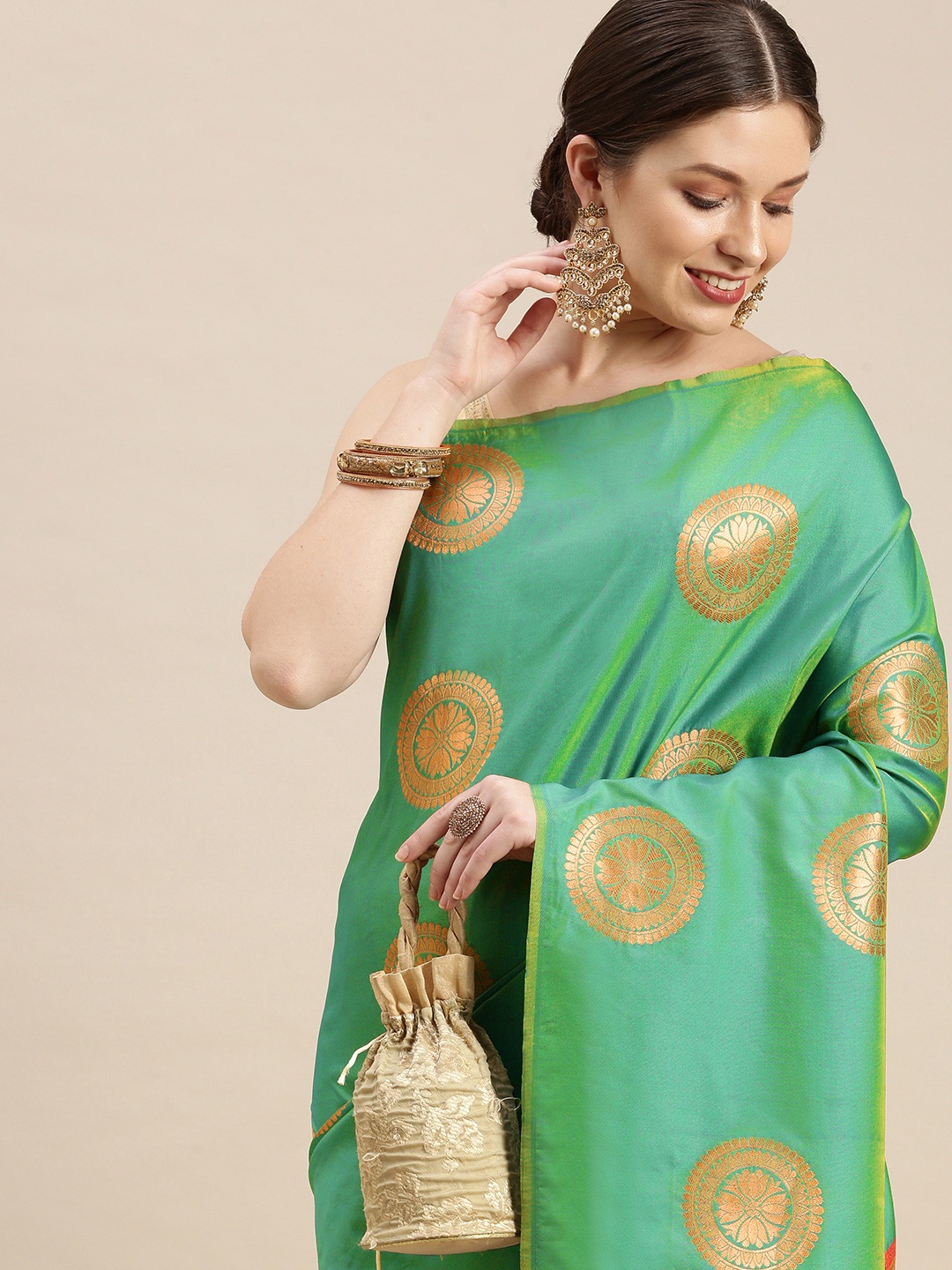 

MARGI DESIGNERS Green & Golden Zari Woven Design Banarasi Saree