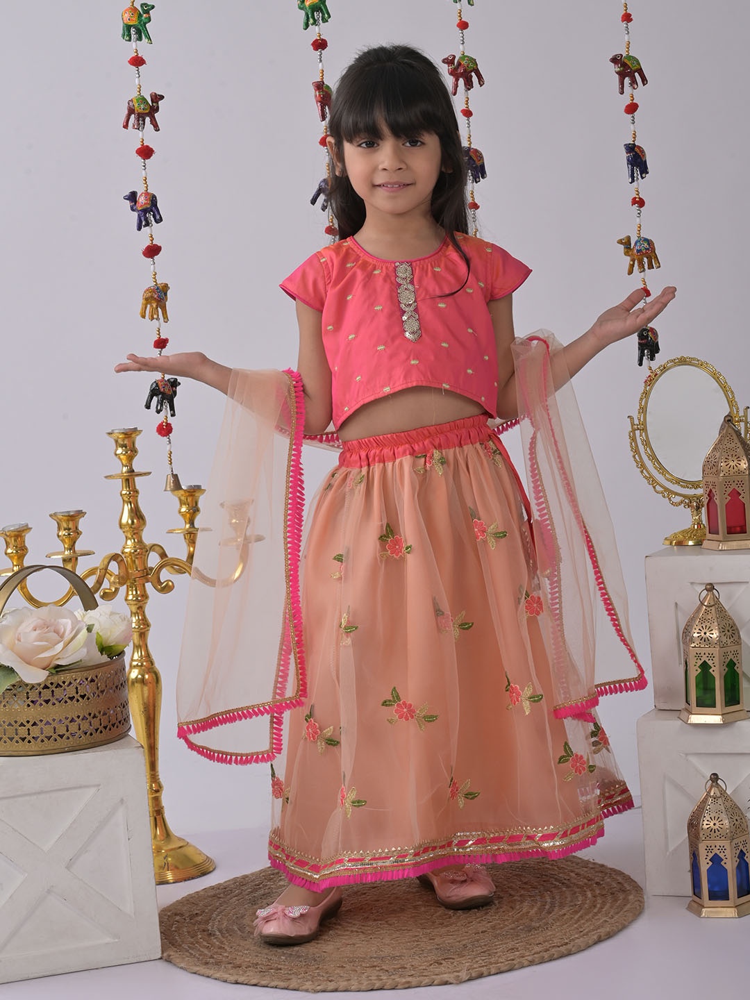 

Here&Now X Kinder Kids Girls Peach-Coloured & Pink Printed Ready to Wear Lehenga & Blouse With Dupatta