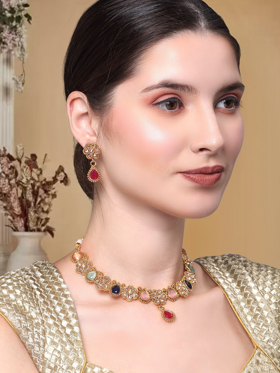 

Yellow Chimes Gold-Plated Red & Blue Crystal Studded Floral Design Teardrop Jewellery Set