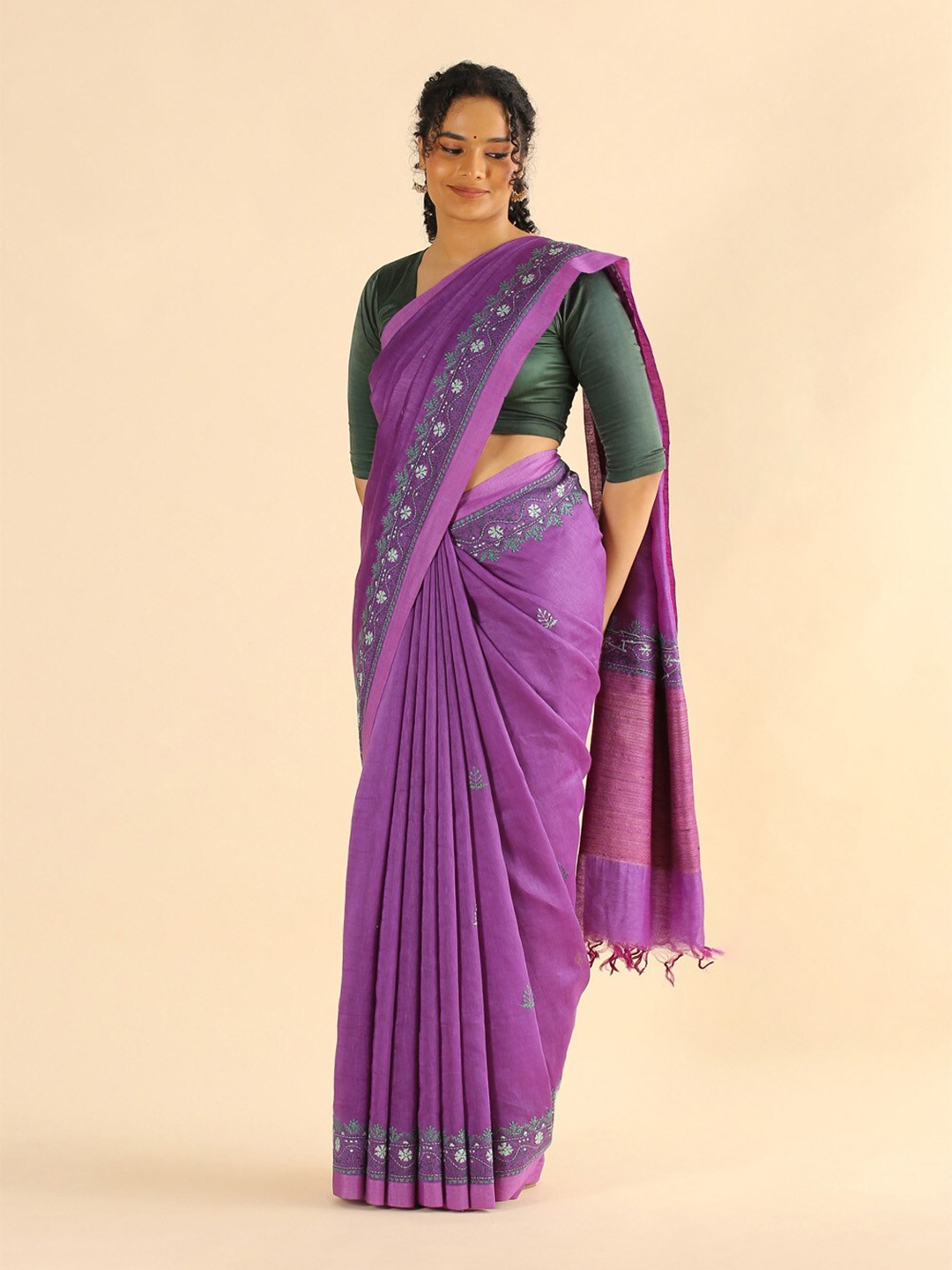 

Taneira Purple & Green Embroidered Linen Blend Saree