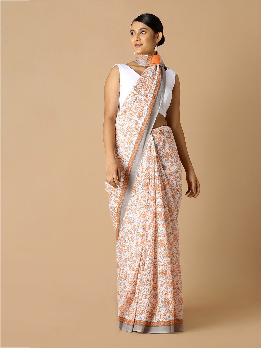 

Taneira Off White & Orange Floral Pure Cotton Saree