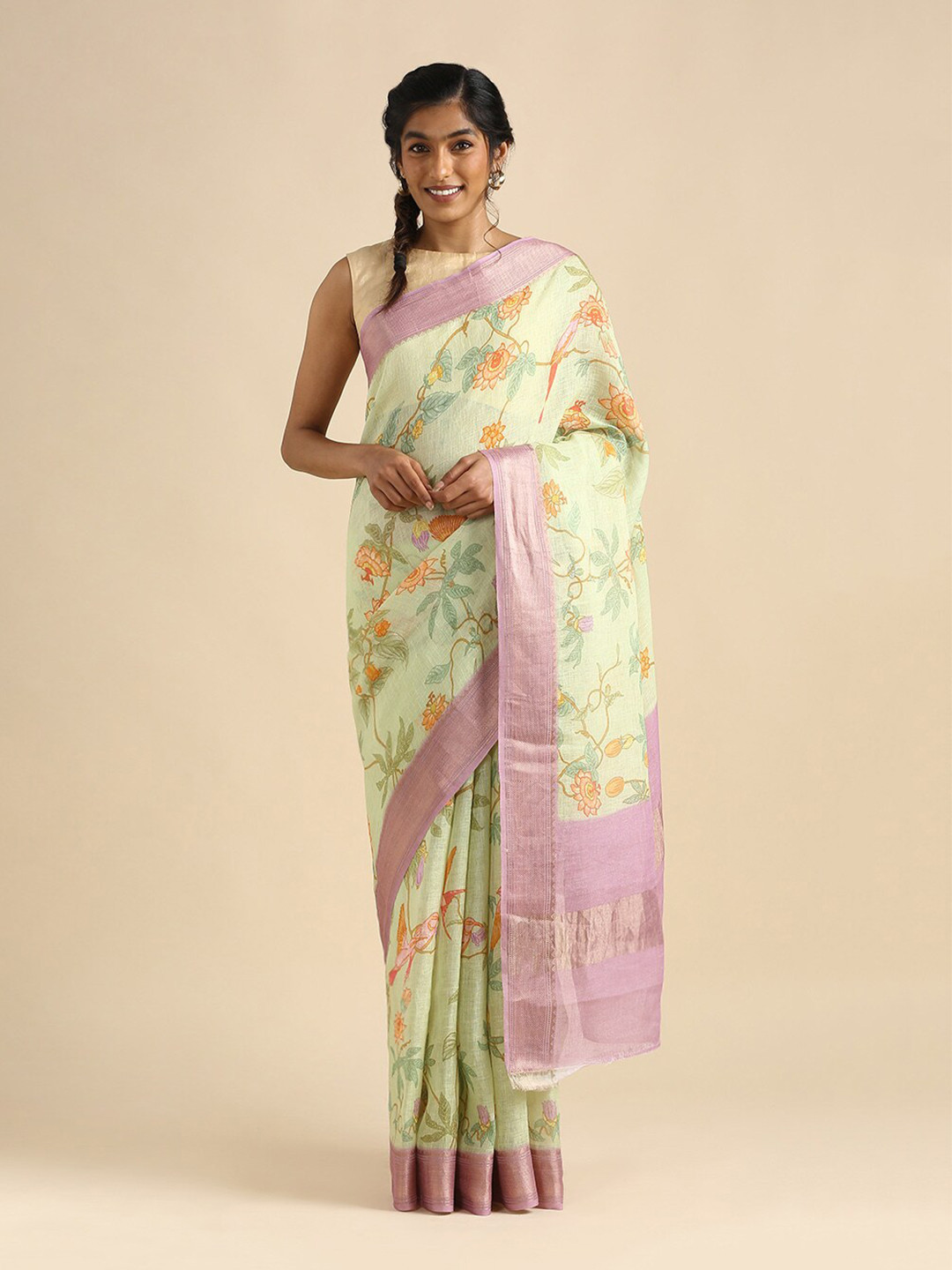 

Taneira Green & Purple Floral Zari Pure Linen Saree