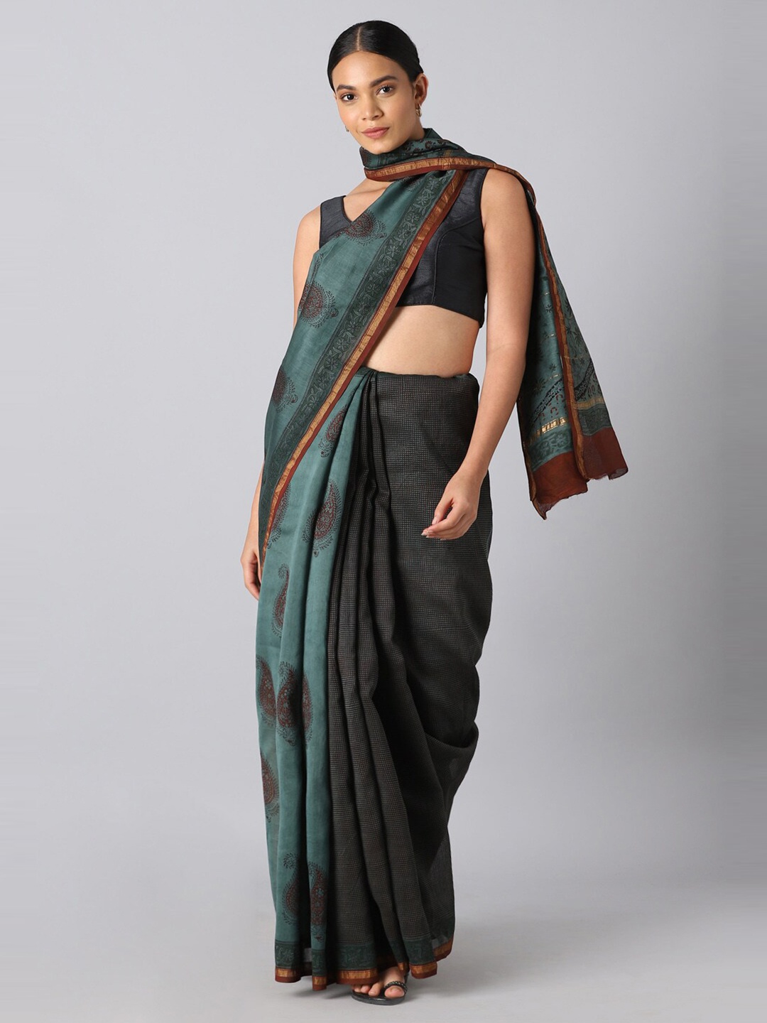 

Taneira Green & Brown Ethnic Motifs Zari Silk Cotton Bagru Saree