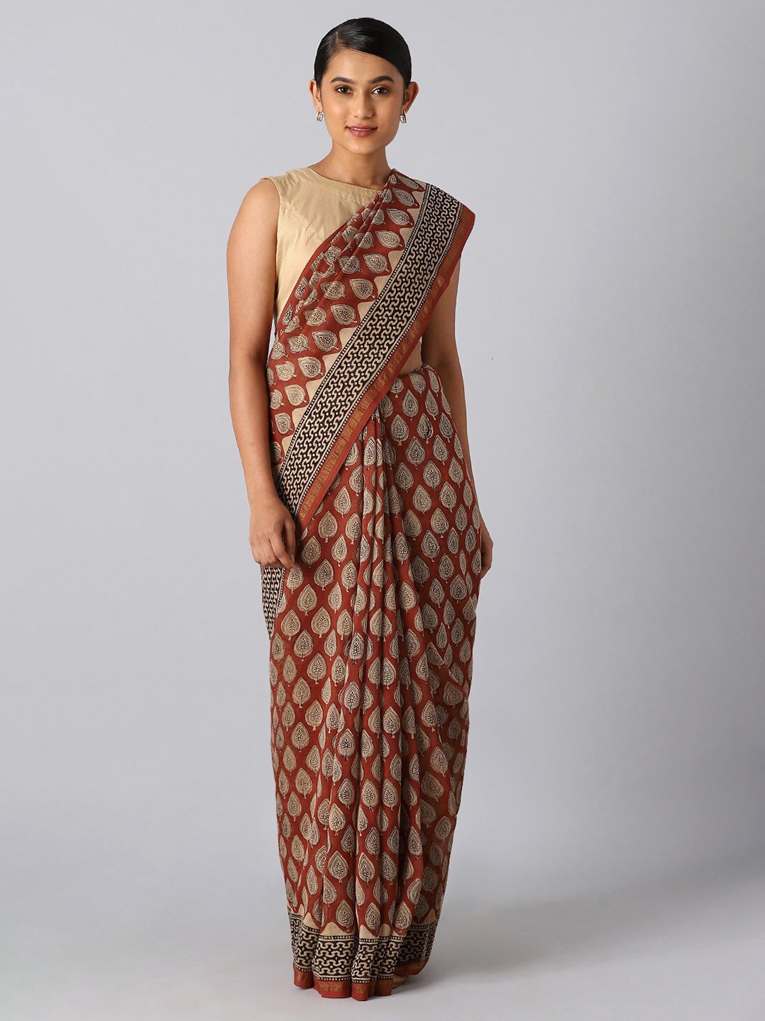 

Taneira Brown & Black Ethnic Motifs Zari Silk Cotton Bagru Saree