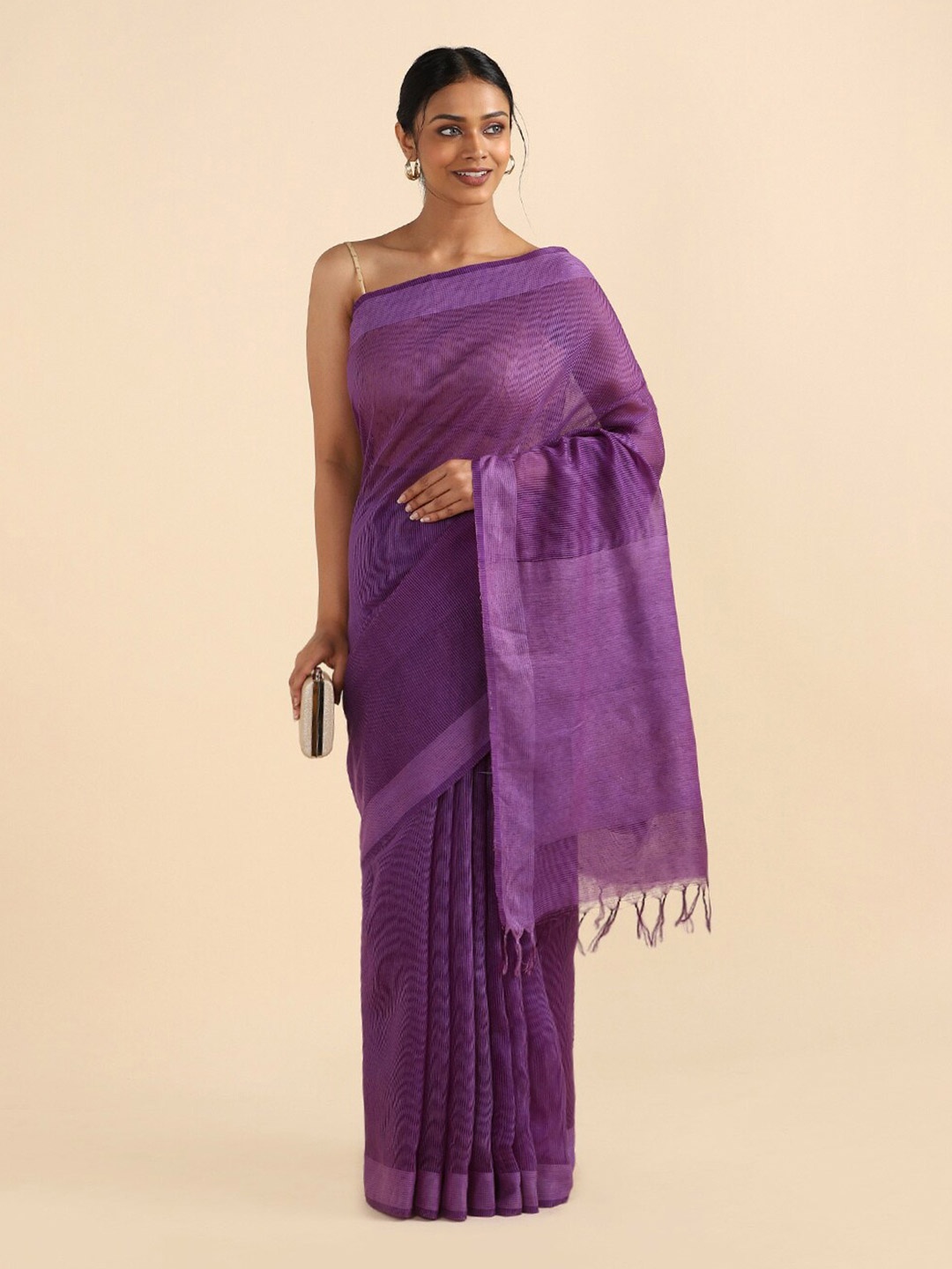 

Taneira Purple & Silver-Toned Zari Pure Silk Saree
