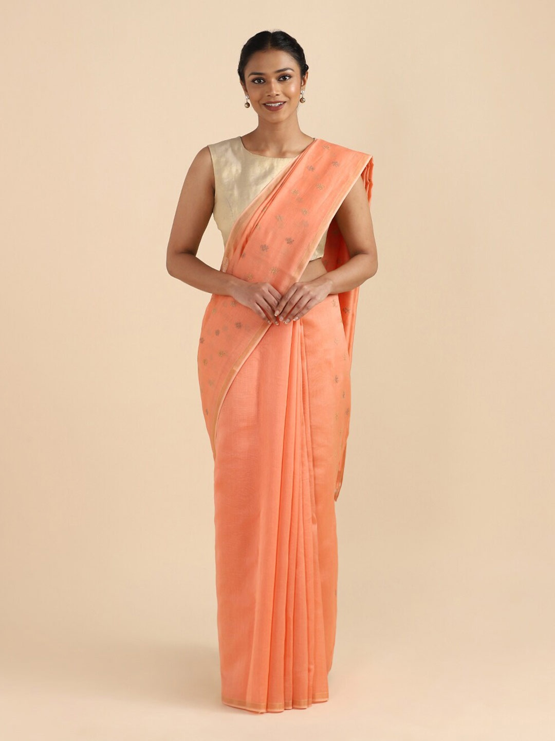 

Taneira Orange And Gold Toned Embroidered Zari Saree