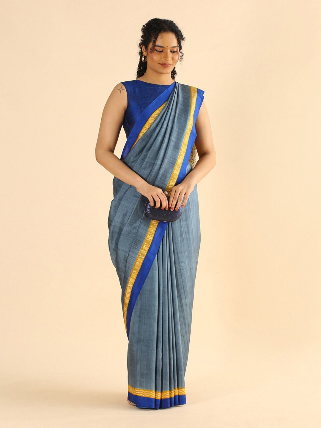 

Taneira Grey & Blue Pure Silk Saree