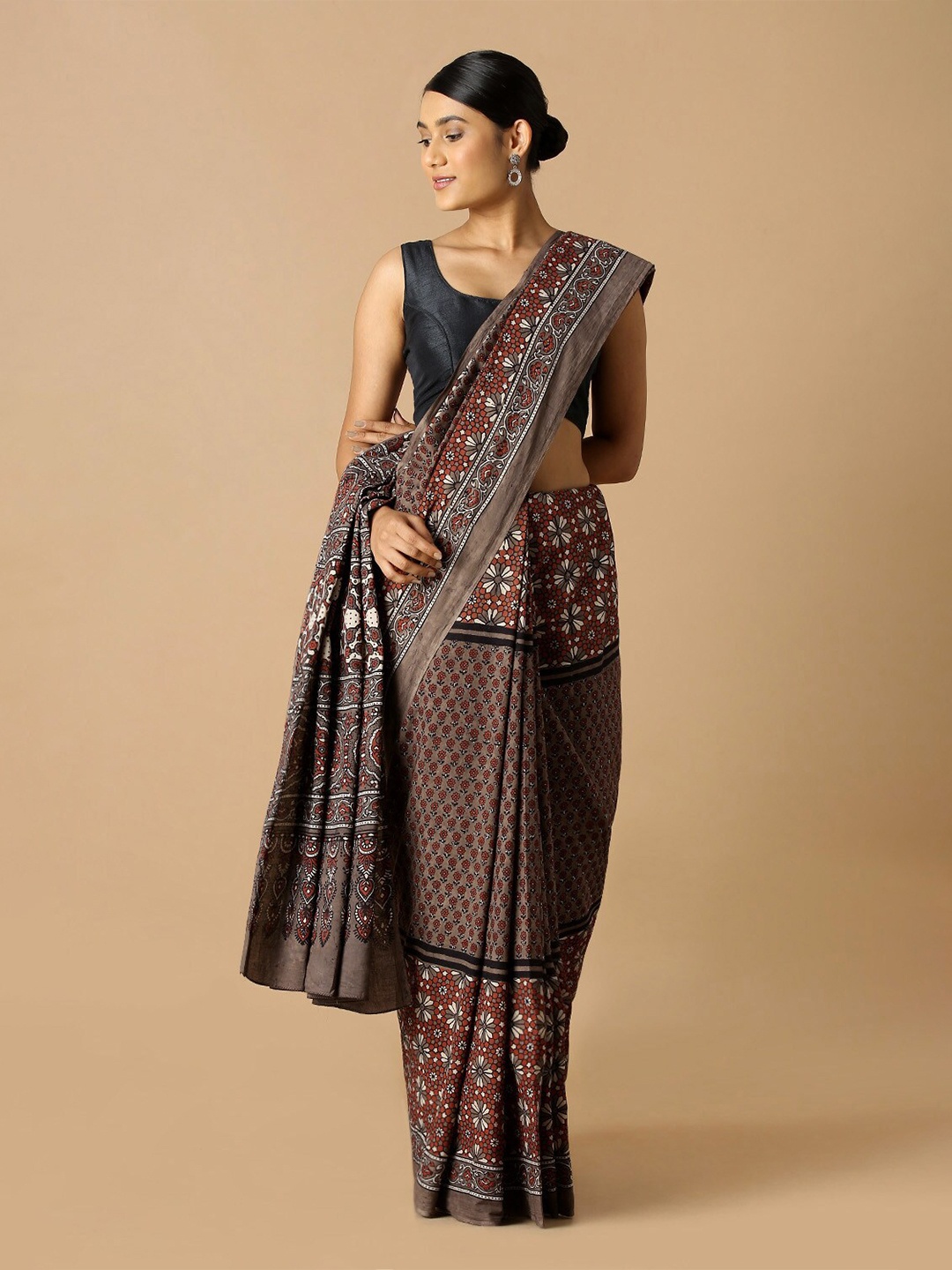 

Taneira Brown And Off White Printed Pure Cotton Ajrak Saree