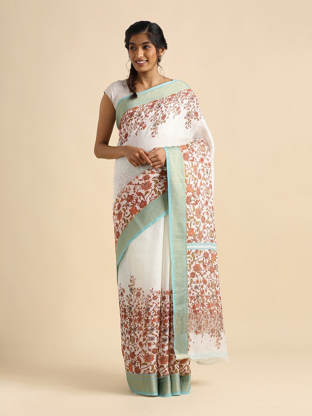 

Taneira Off White & Red Floral Zari Pure Linen Saree