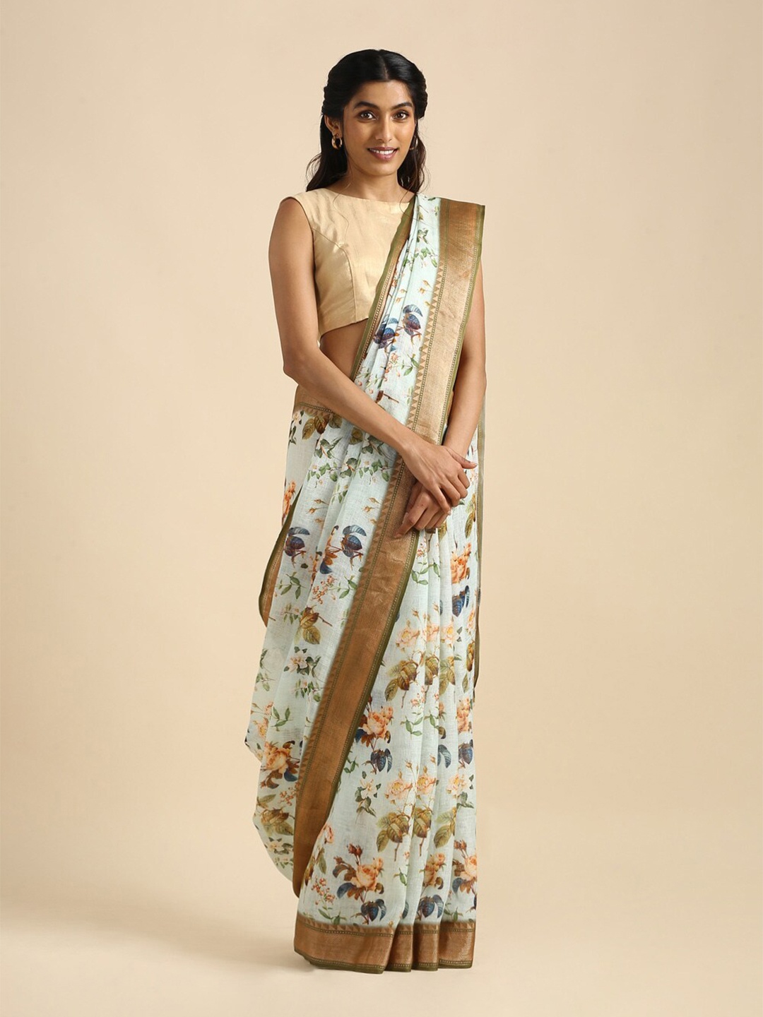 

Taneira Blue & White Floral Zari Pure Linen Saree