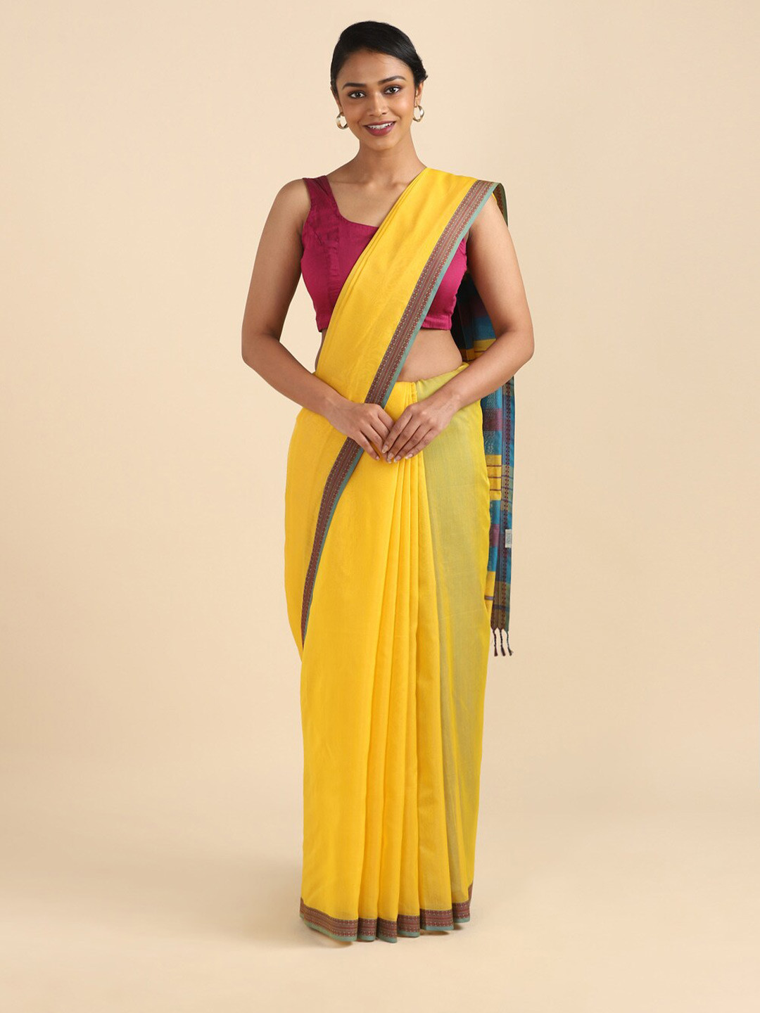 

Taneira Yellow & Blue Silk Cotton Maheshwari Saree
