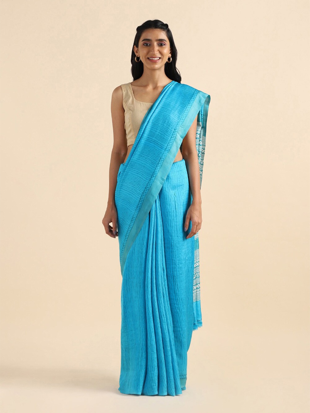

Taneira Blue & White Striped Pure Silk Saree