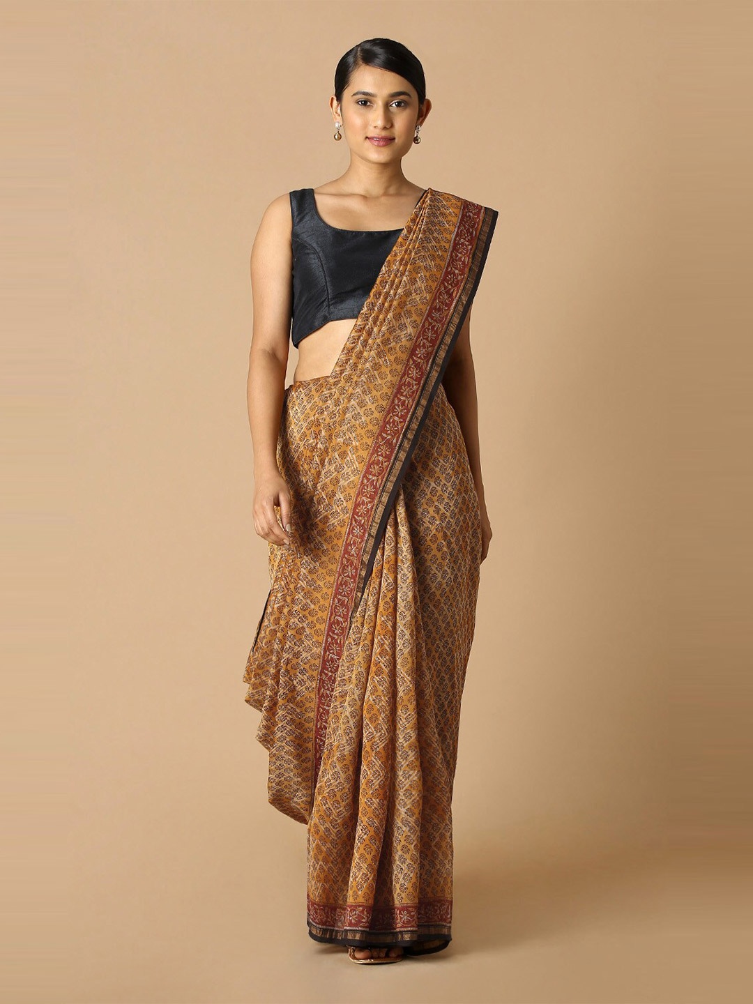

Taneira Yellow & Black Ethnic Motifs Silk Cotton Bagru Saree