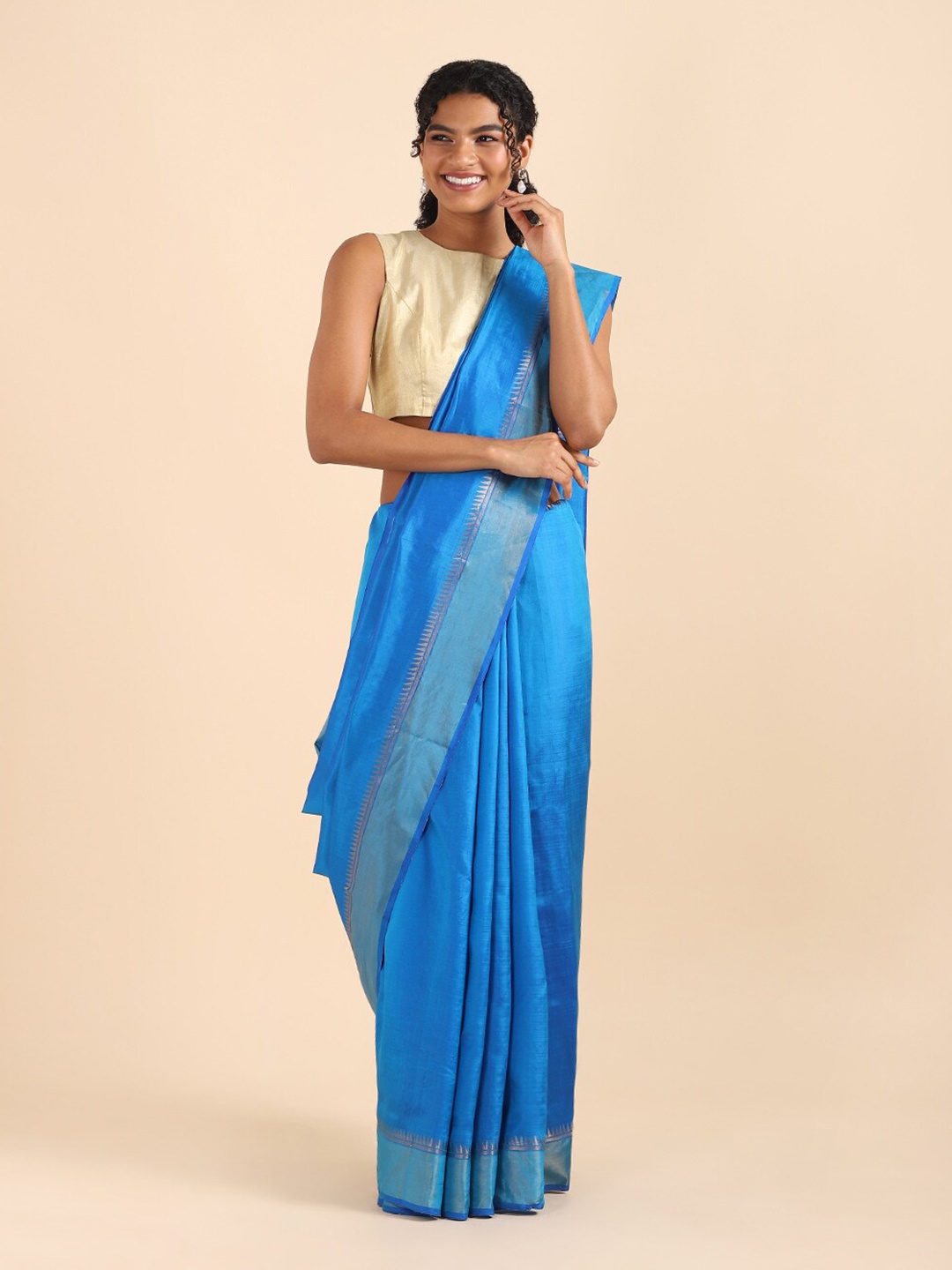 

Taneira Blue & Gold-Toned Zari Pure Silk Saree